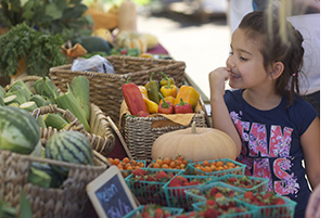 Child with Fresh Vegetables